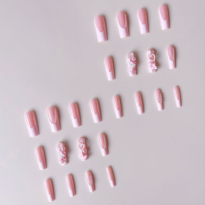 Acrylic nail set with playful 3D accents and pearl details Stornfield