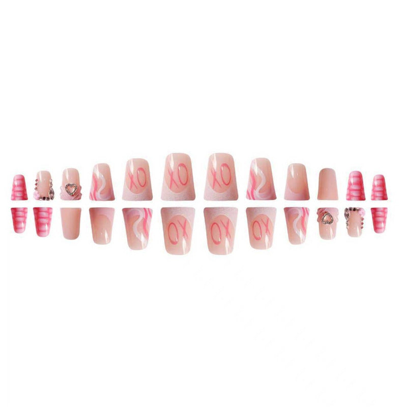 Decorative Press-On Nail Design with Heart and Gem Accents Stornfield