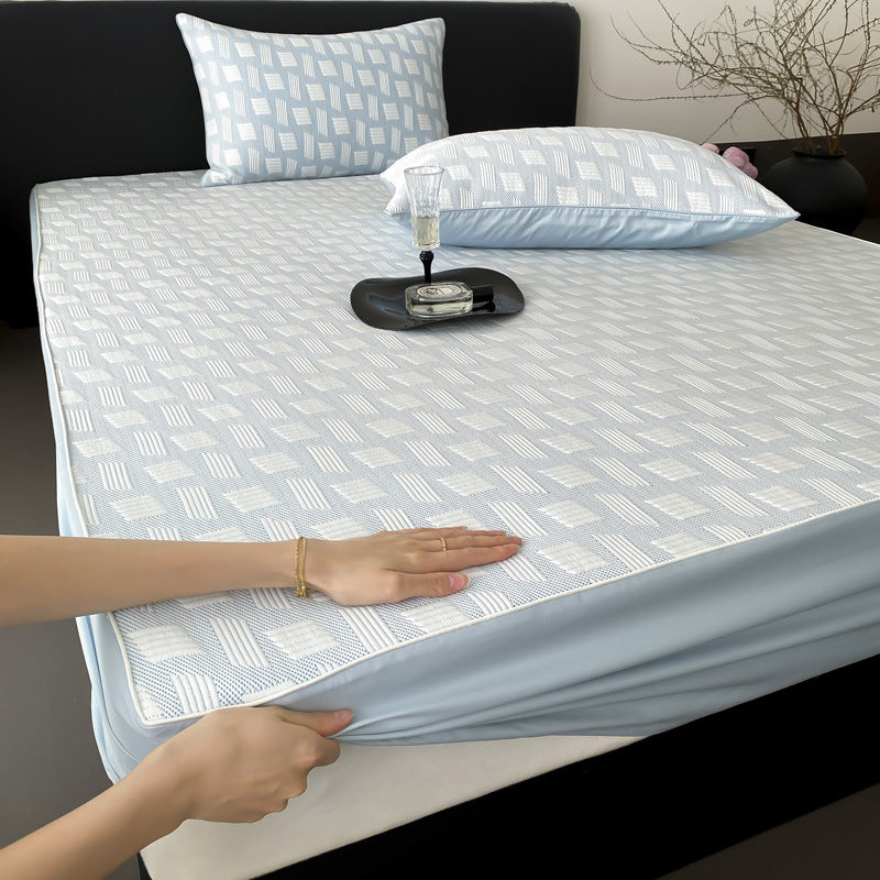 Quilted mattress protector with all-round elastic and floral relief structure