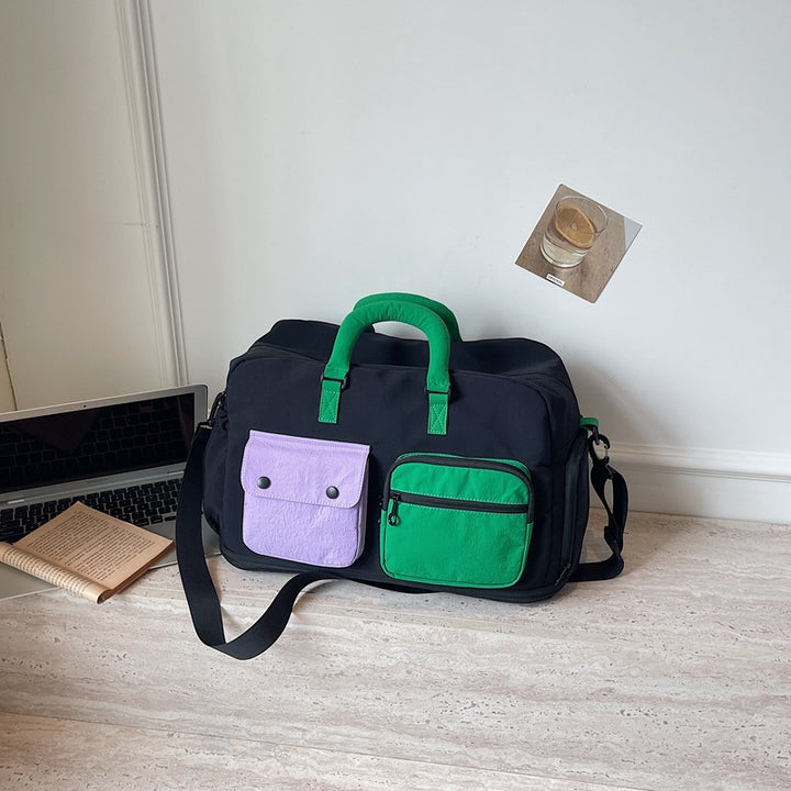 Sporty travel bag with multifunctional outer pockets Stornfield