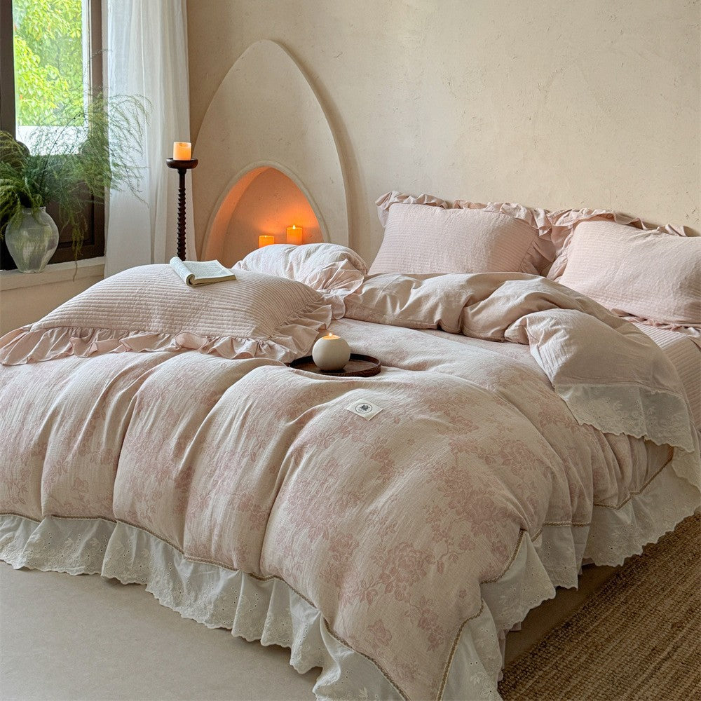 Luxurious quilted cotton bedding set with ruffles and embroidered details
