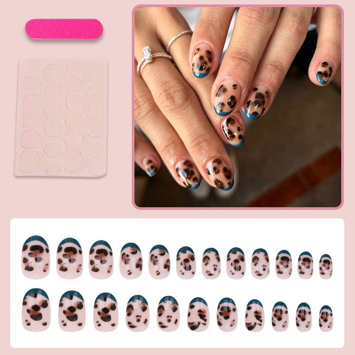 Artificial nail set with elegant leopard pattern and colorful French tip Stornfield