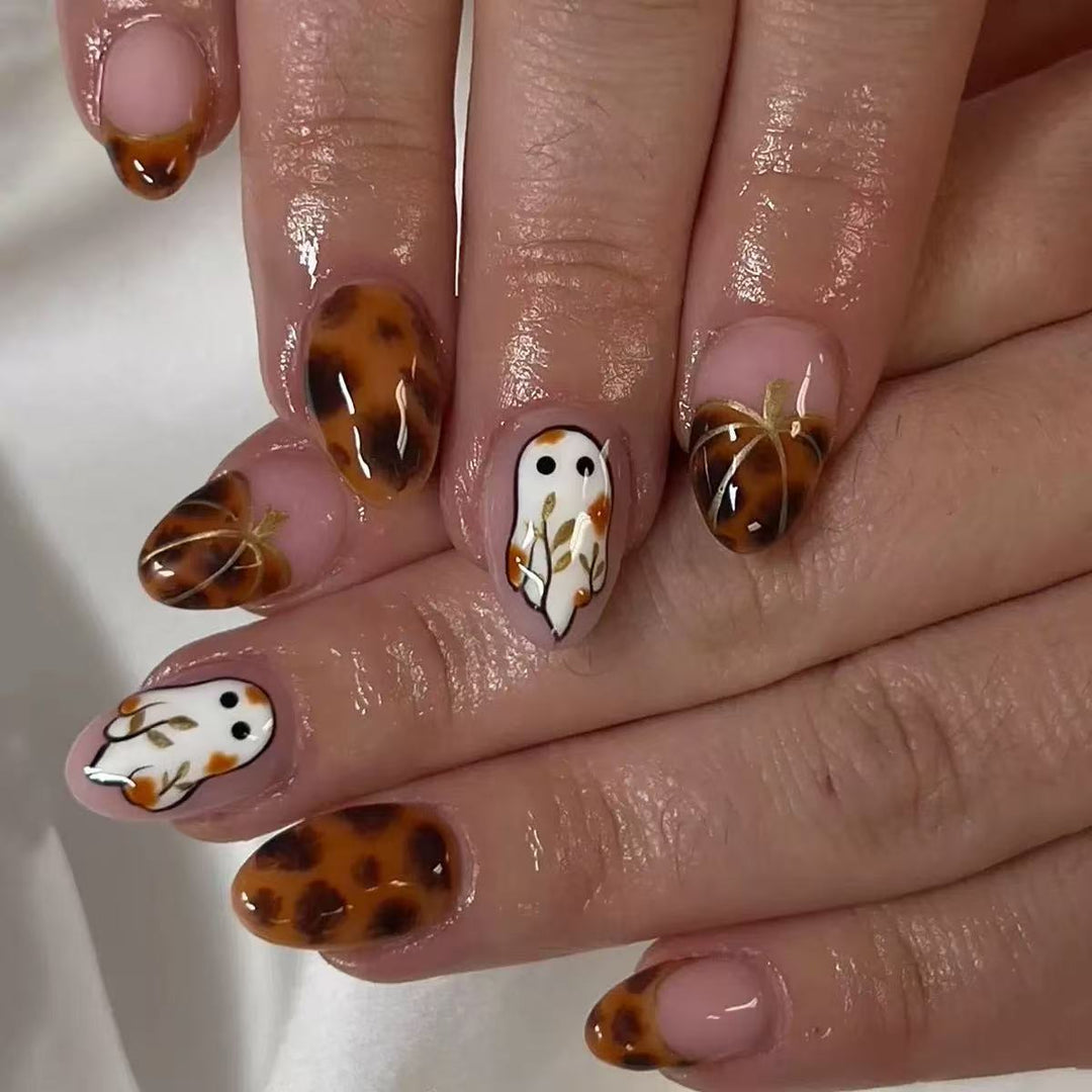 Nail art set with elegant owl motifs and animal accents Stornfield