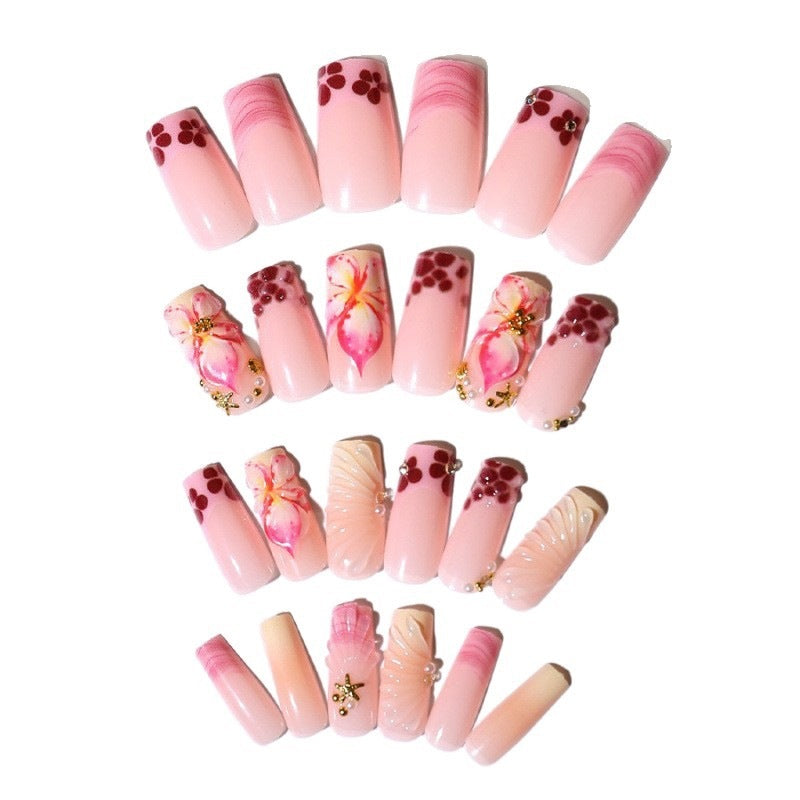 Artificial nail set with exquisite flower and glitter accents Stornfield