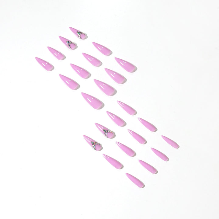 Glamorous stiletto nails with rhinestone decoration Stornfield