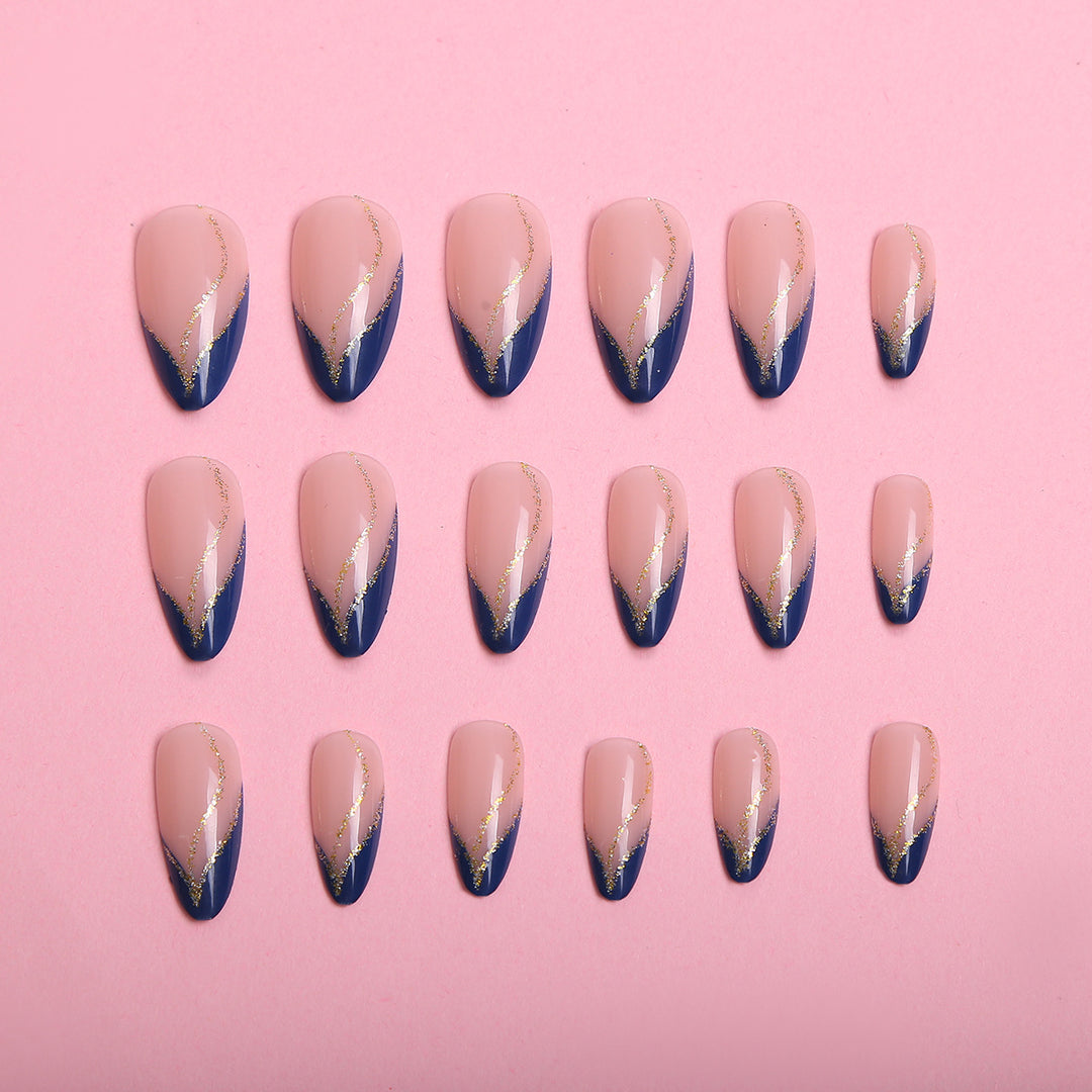Artistic Nail Design with Elegant Golden Accents Stornfield