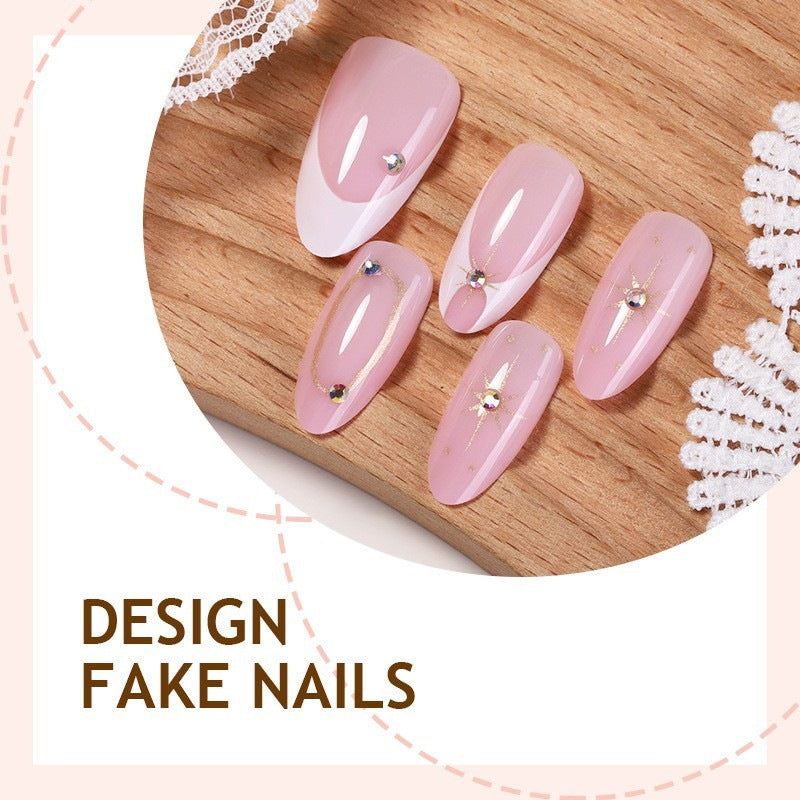 Artificial nail set with elegant lace design and glamorous accents Stornfield