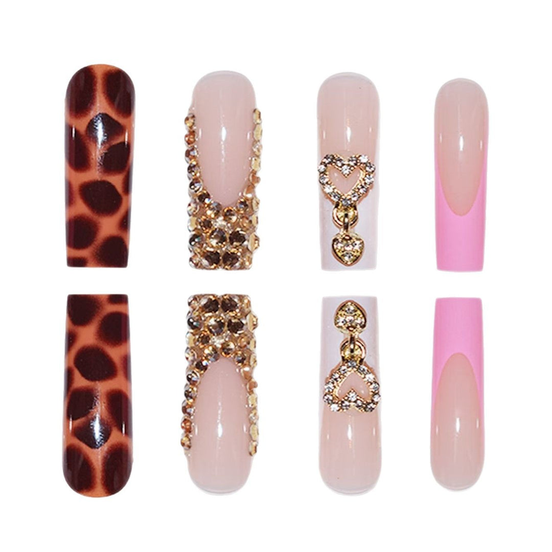 Glamorous Decorative Long Press-On Nails with Metallic Accents Stornfield