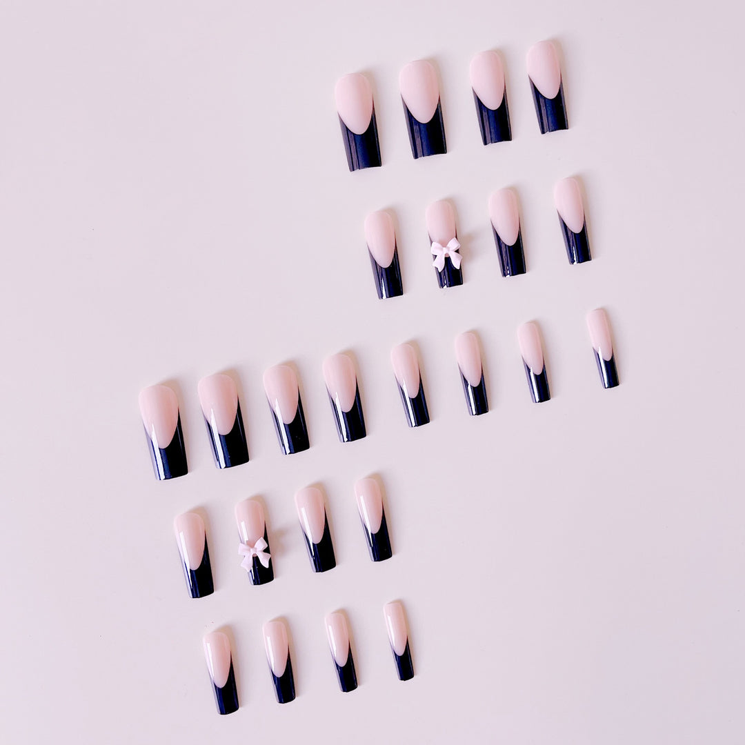 Artful Nail Extensions with Bow Design Stornfield