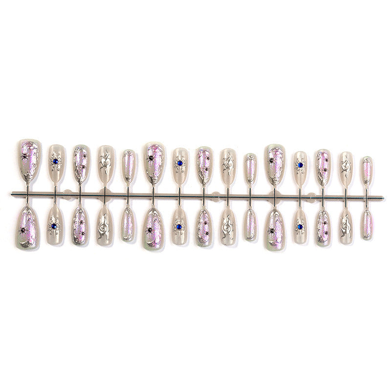 Artificial nail set with shiny metallic effect and elegant decorations Stornfield