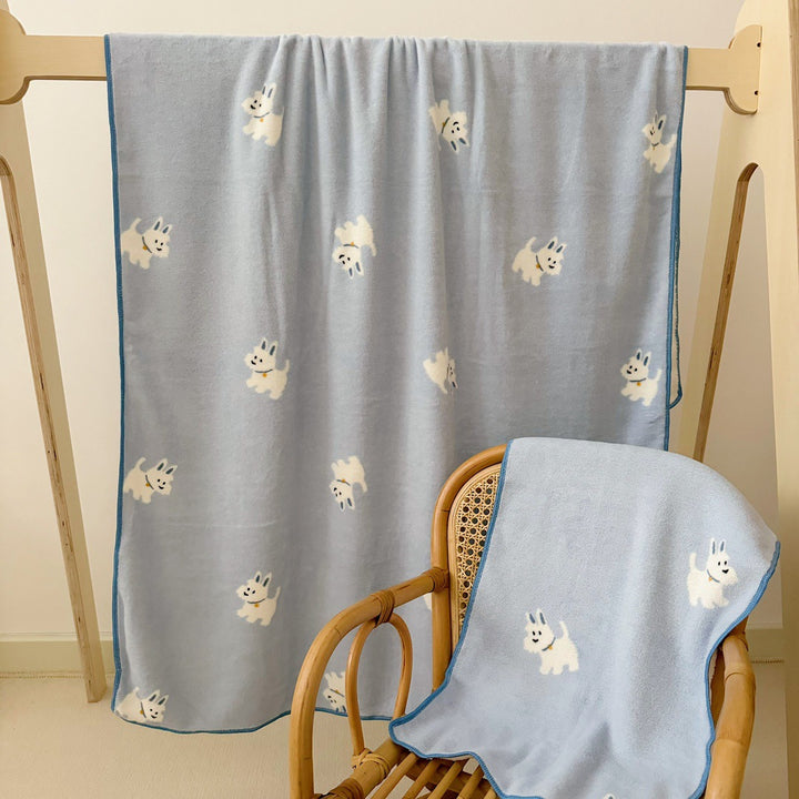 Cuddle blanket for baby and toddler with cute dog motif and soft microfleece