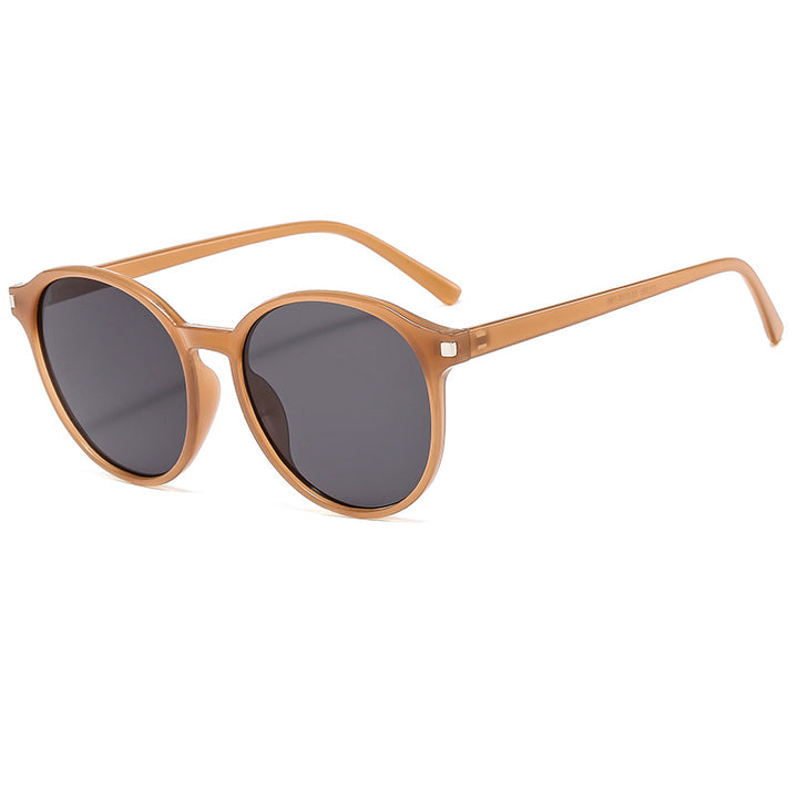 Women's retro-inspired sunglasses with curved frames and UV protection Stornfield