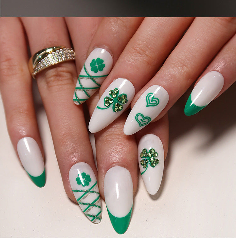 Artful nail extensions with an elegant leaf pattern Stornfield