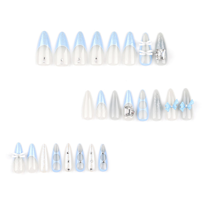 Artistic stiletto nails with elegant jewelry accents Stornfield