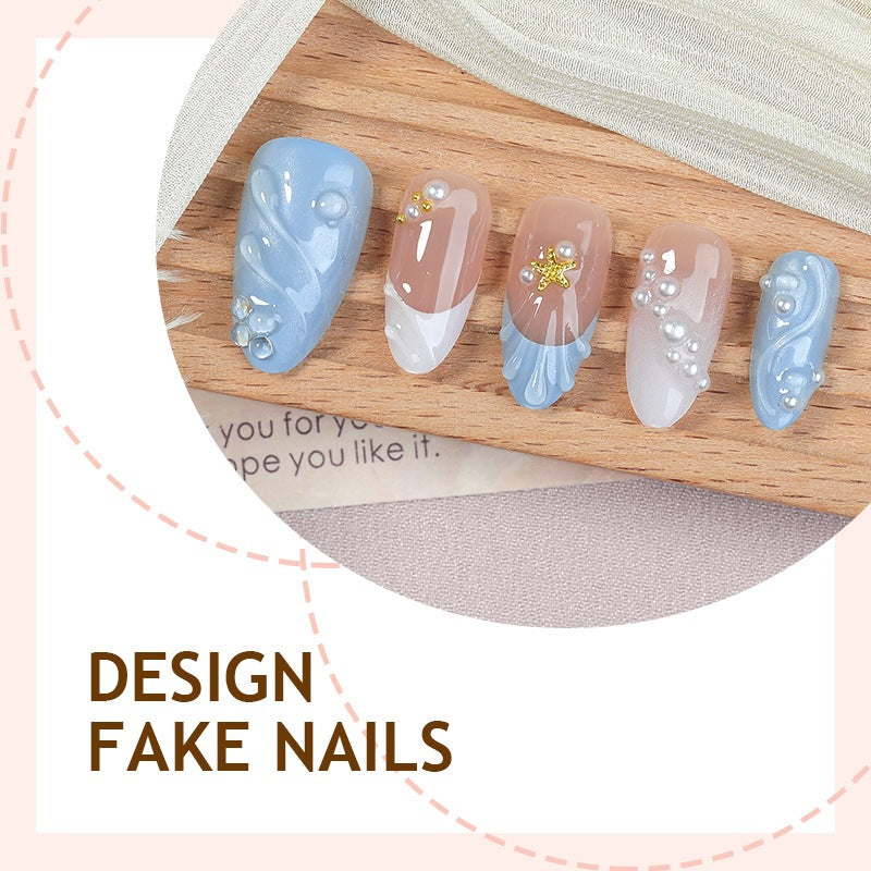 Nail art set with delicate design and elegant accents Stornfield