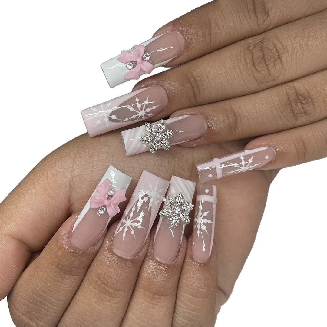Creative nail art set with filigree snowflake and bow decorations Stornfield