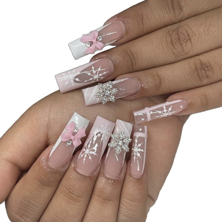 Creative nail art set with filigree snowflake and bow decorations Stornfield