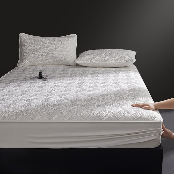 Quilted mattress topper as fitted cover with non-slip underside