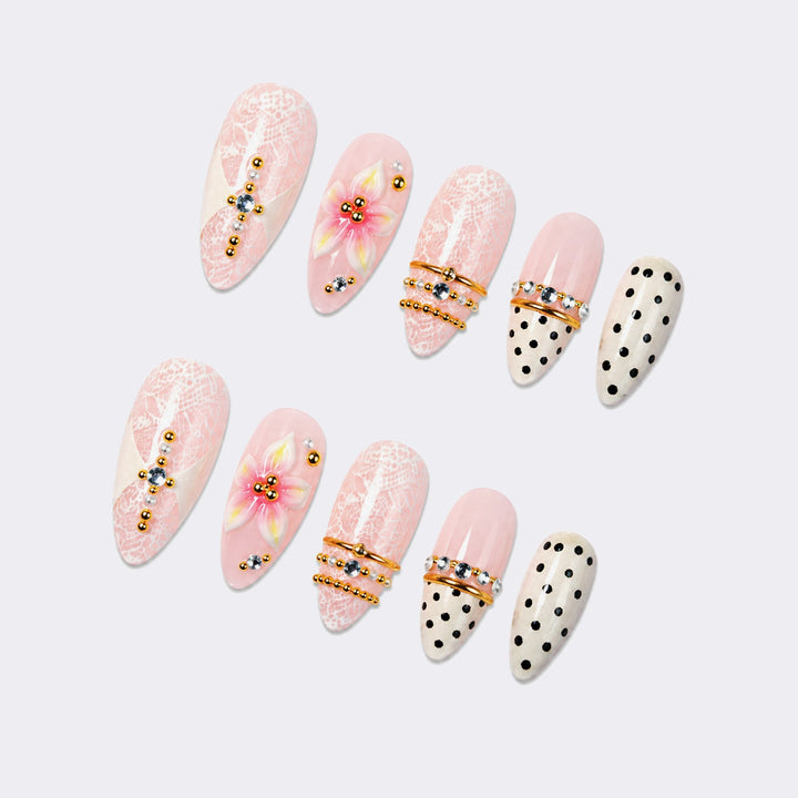 Artificial nail set with floral and glittering accents Stornfield