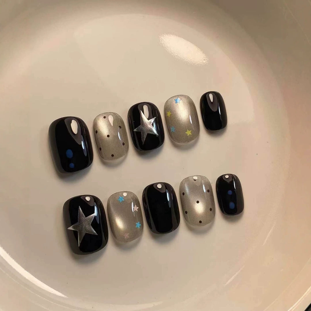 Artistic Press-On Nail Set with Celestial Designs