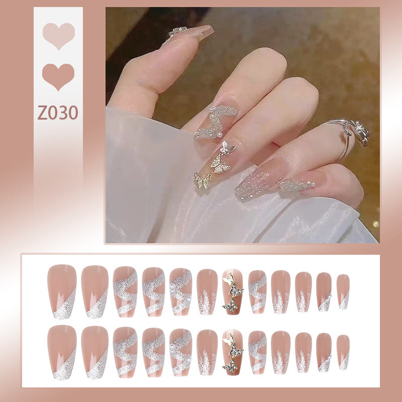 Artificial nail set with sparkling butterflies and glittering decorations Stornfield