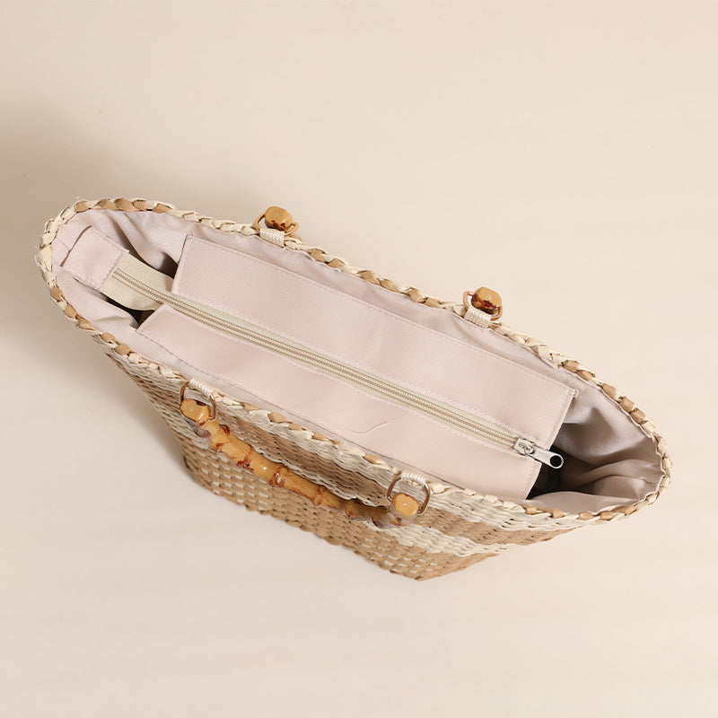 Braided bast bag with bamboo handle and decorative lining Stornfield