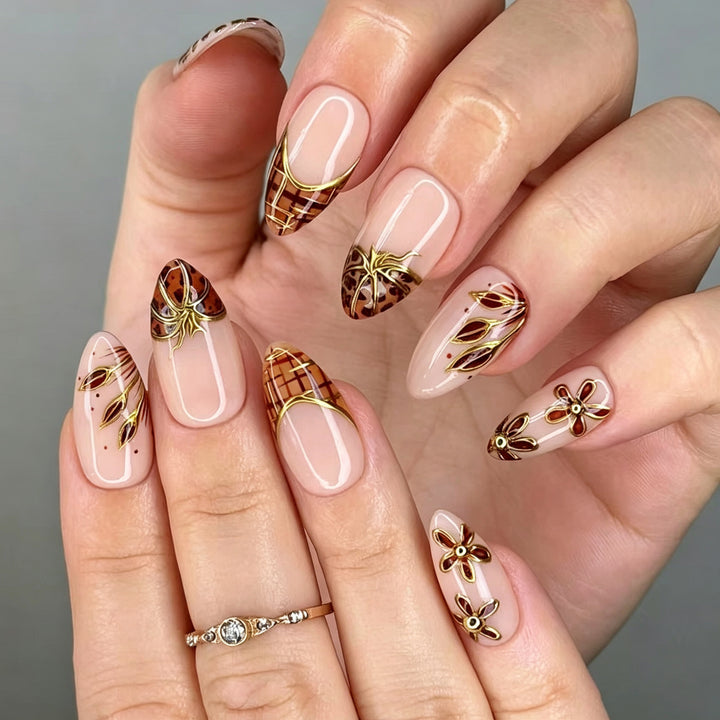 Decorative Press-On Nail Art Set with Elegant Floral and Gold Accents Stornfield