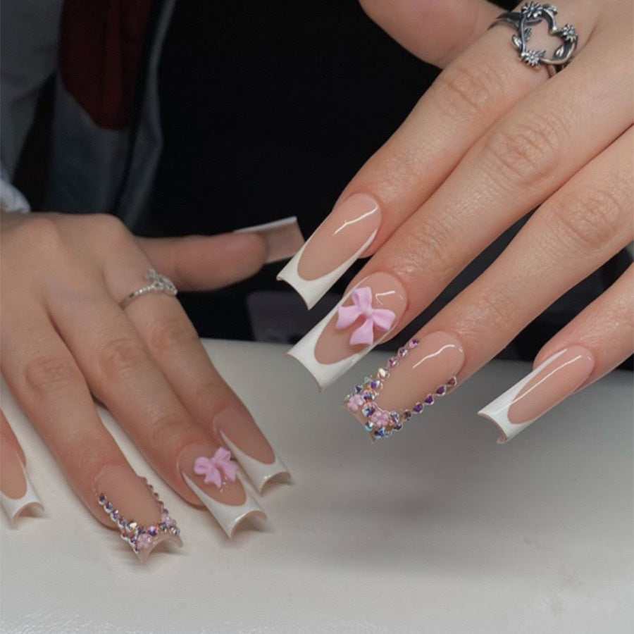 Artifical nail set with glamorous 3D bows and crystal embellishments Stornfield