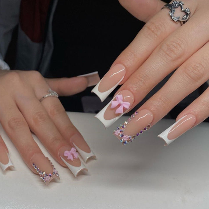 Artifical nail set with glamorous 3D bows and crystal embellishments Stornfield