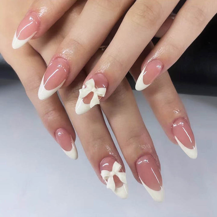 Artificial nail set with luxurious 3D bow decorations Stornfield