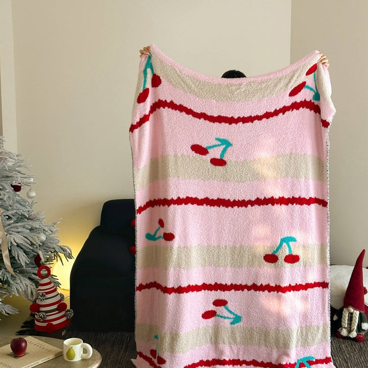 Cozy blanket in knit look with large animal face and soft terry surface