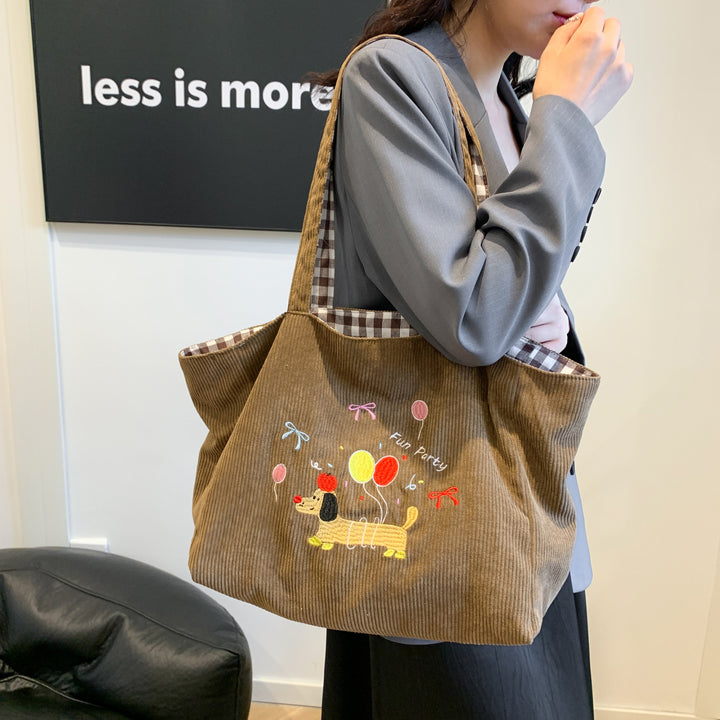 Cotton bag with playful dog motif Stornfield