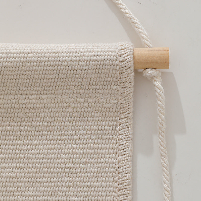 woven wall hanging with fringes and rabbit motif Stornfield