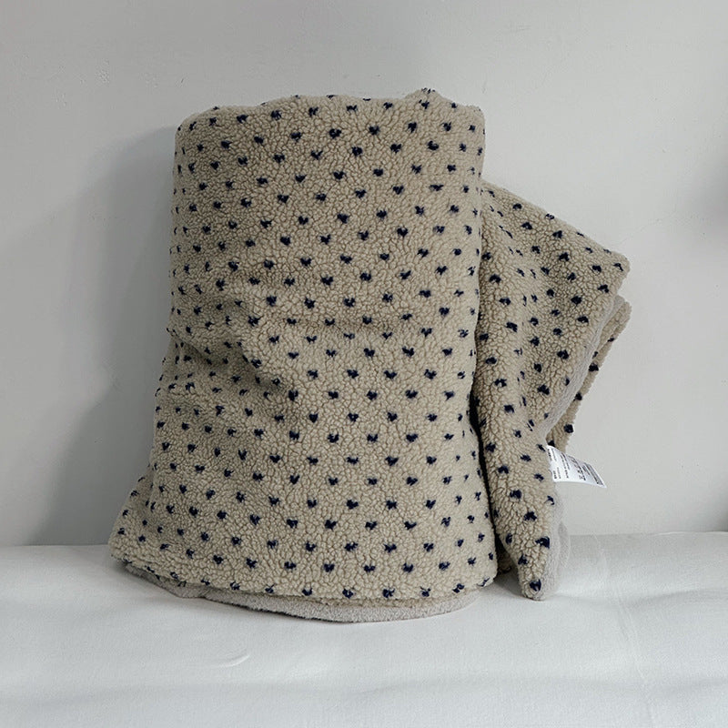 Plush Sherpa throw blanket with abstract pattern and extra-soft teddy fleece
