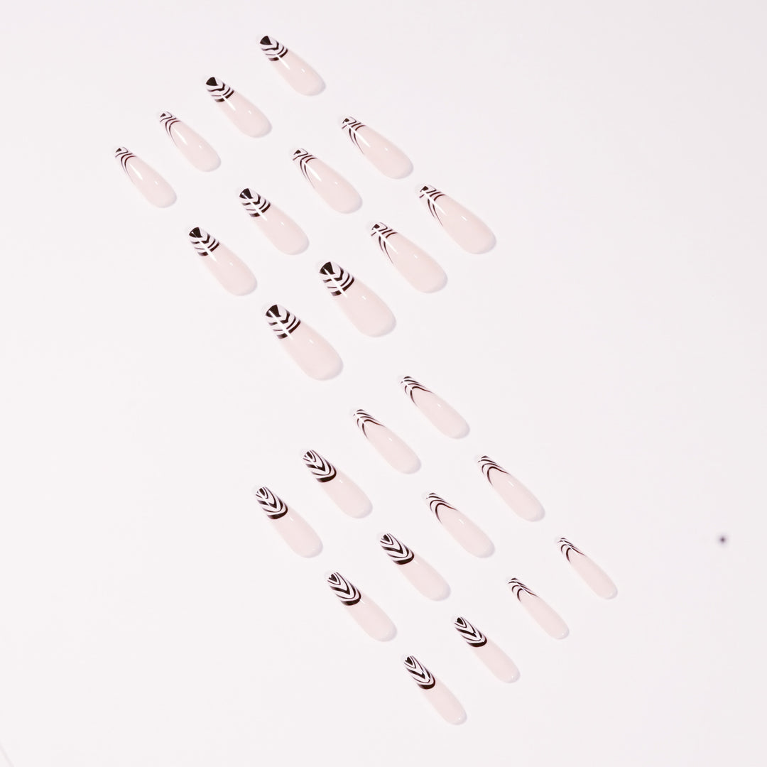Artful Nail Extensions with Elegant Black-White Pattern Stornfield