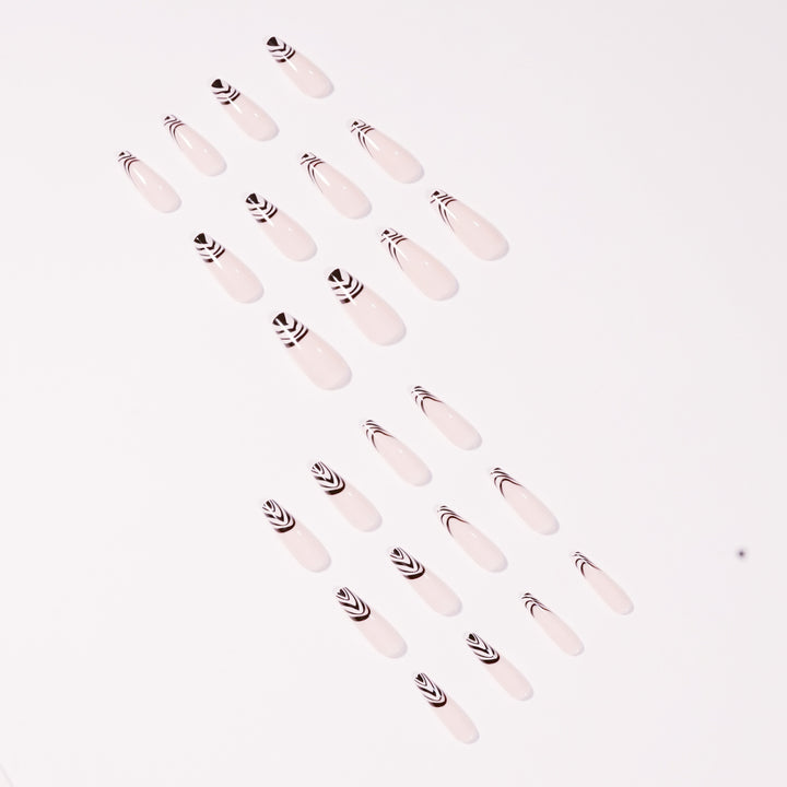 Artful Nail Extensions with Elegant Black-White Pattern Stornfield