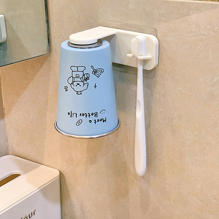 Wall-mounted toothbrush holder with playful design Stornfield