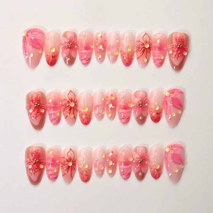Artificial nail set with floral designs and sparkling accents Stornfield