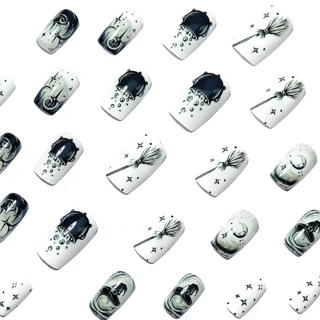 Creative acrylic nails with witch motifs Stornfield