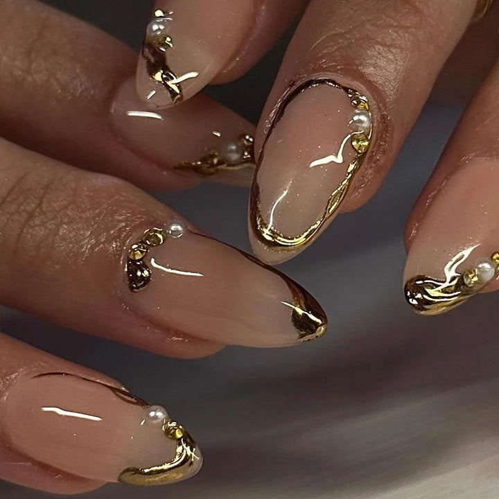 Elegant artificial nails with golden accents Stornfield