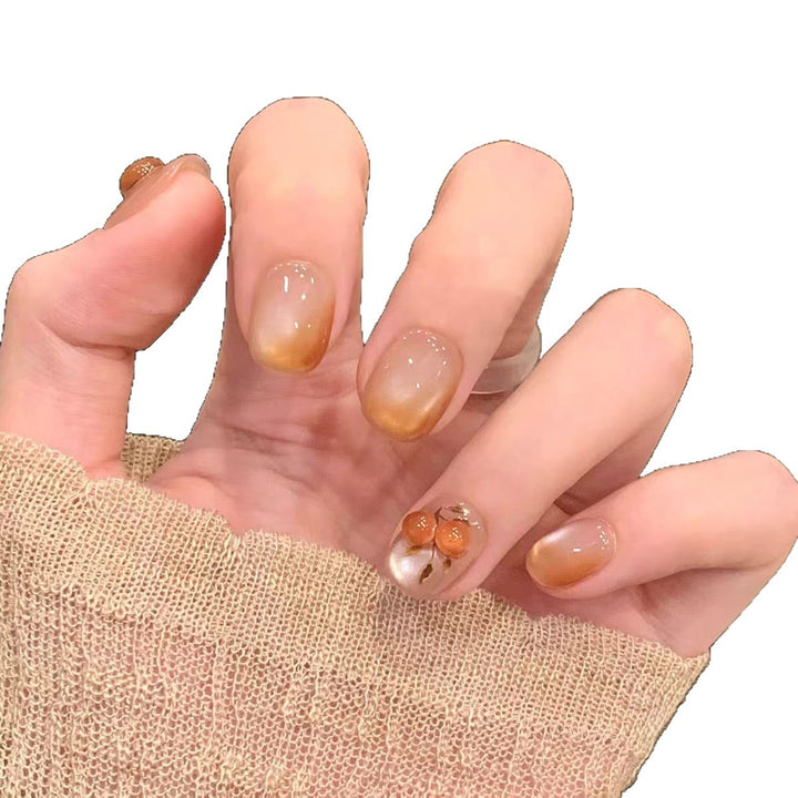 Artificial nails with elegant ombre effect and floral accents Stornfield