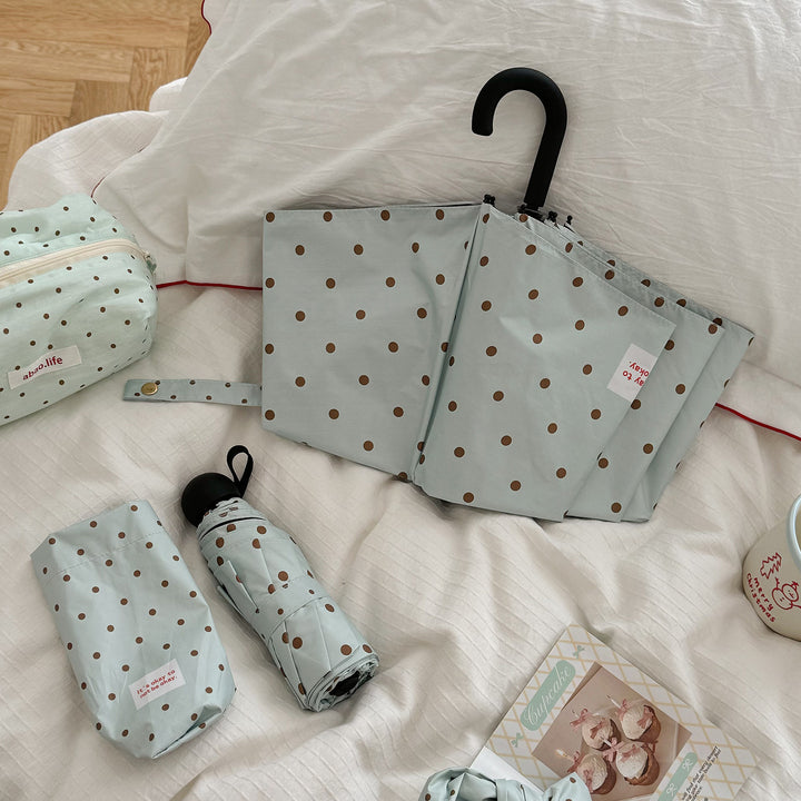 Women's Folding Umbrella with Practical Button Mechanism and Stylish Polka Dot Design Stornfield