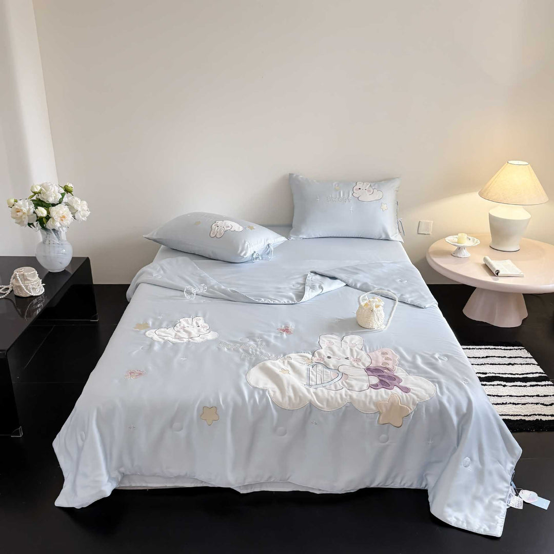 Cotton satin children's bedding set with embroidered cloud and animal appliqués