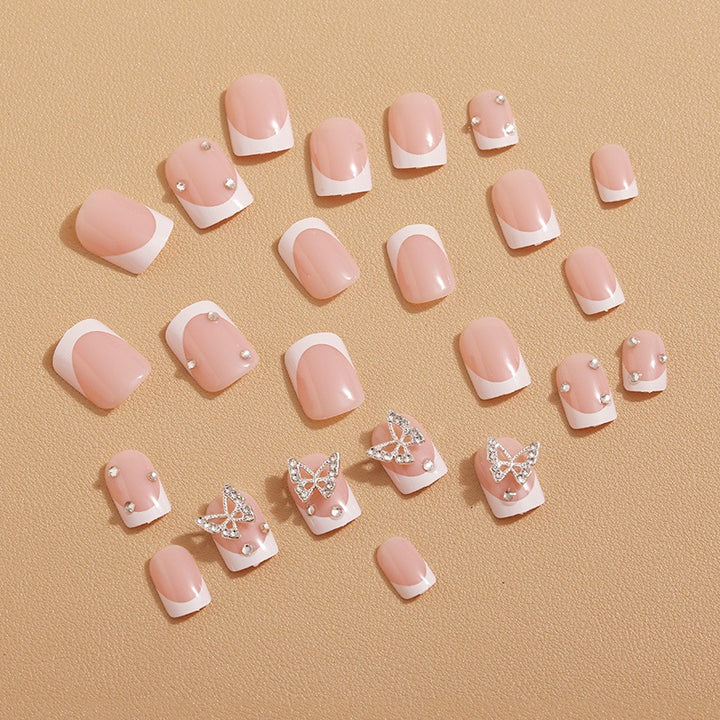 Artificial nails with elegant butterfly embellishments Stornfield