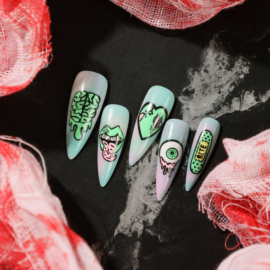 Artistic stiletto nails with creative designs and intricate detailing Stornfield