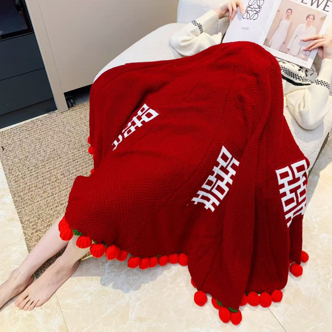 Snuggle blanket with decorative pompom fringes Stornfield