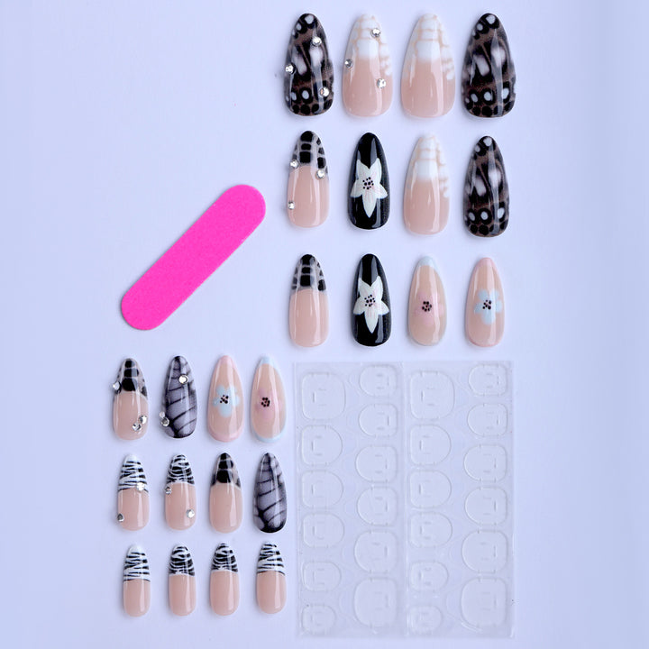 Nail art with elegant designs and embellishments Stornfield