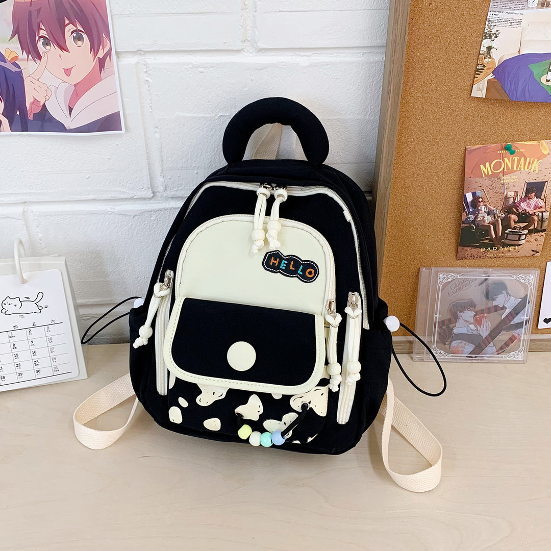 Leisure Backpack with Colorful Applications and Creative Design Stornfield