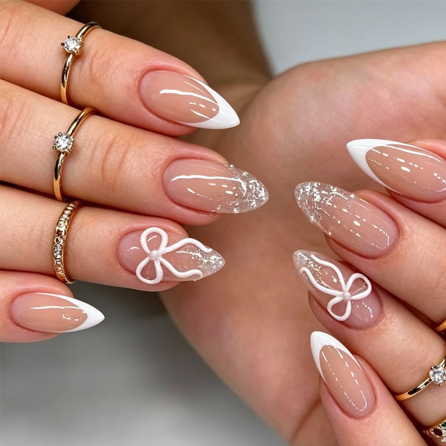Artificial nail set with elegant tips and glitter accents Stornfield