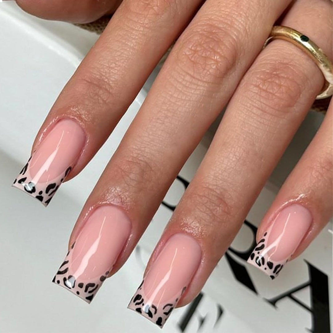 Artificial nails with leopard edges and glitter details Stornfield